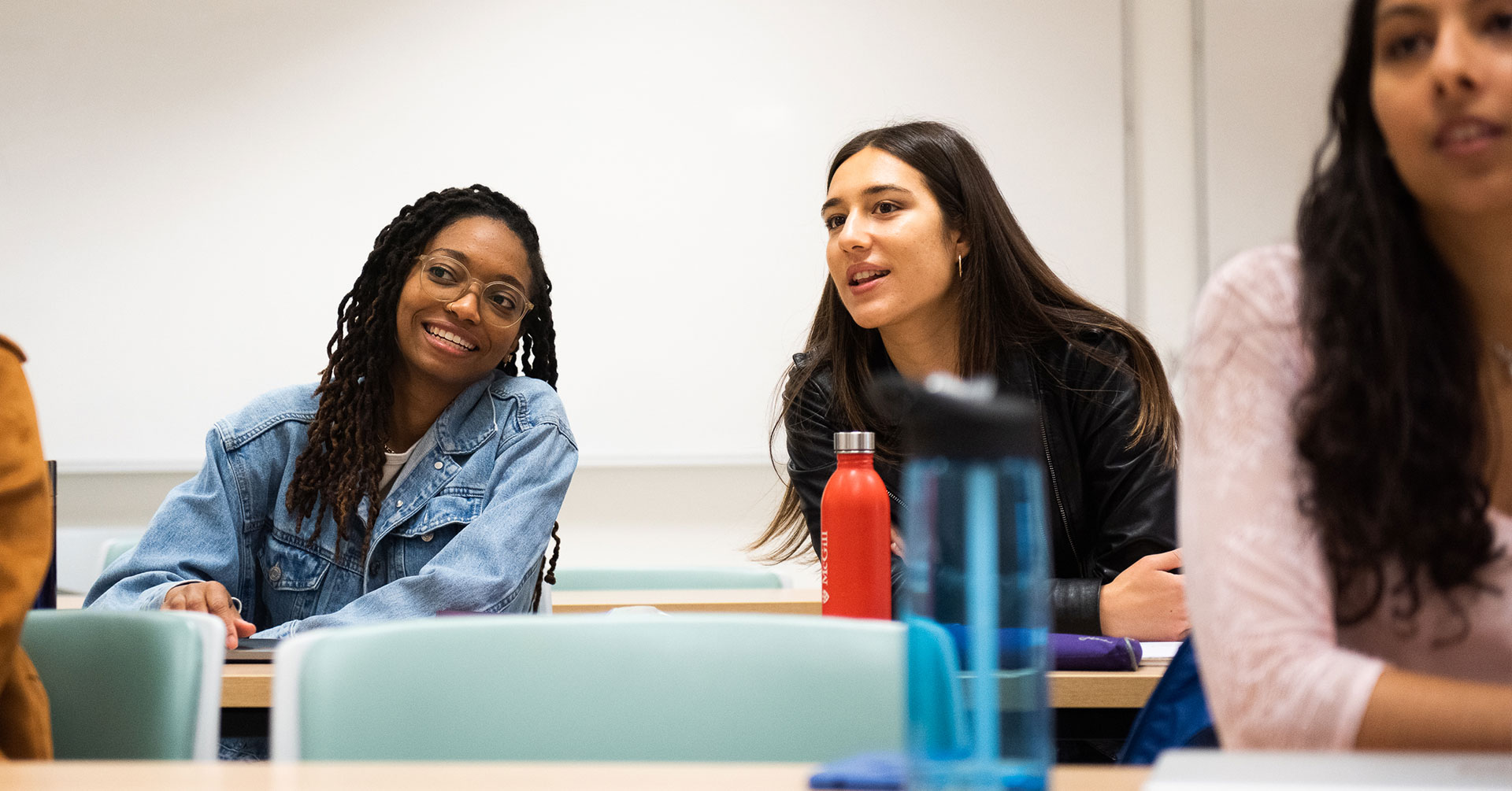 Nursing students work in a classroom setting