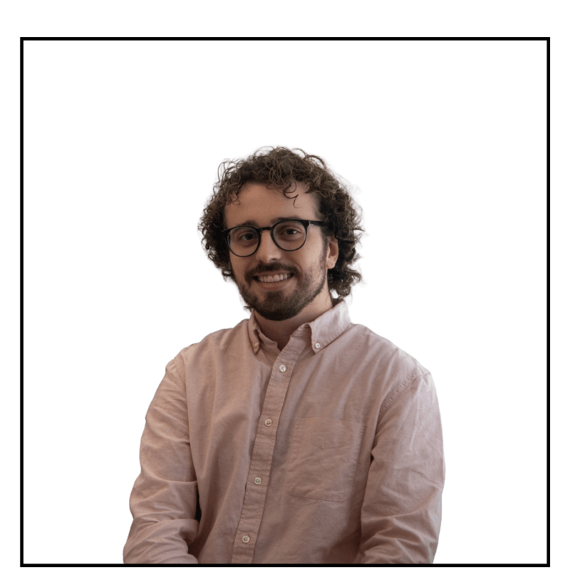 Recruitment Officer Jason, smiling, with glasses and short, curly brown hair